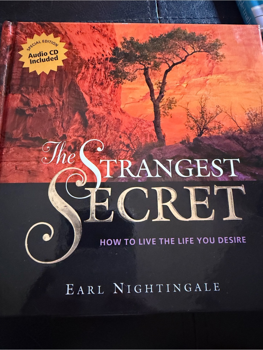The Strangest Secret Hardcover - Earl Nightingale, Orange and Black